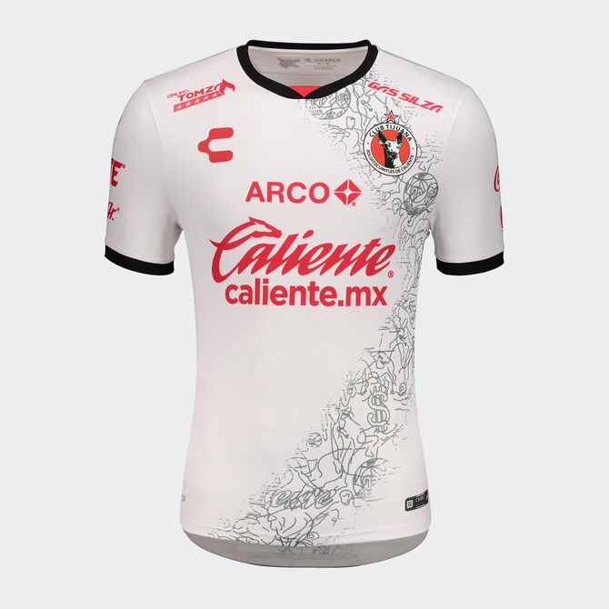 con camisa de los xolos